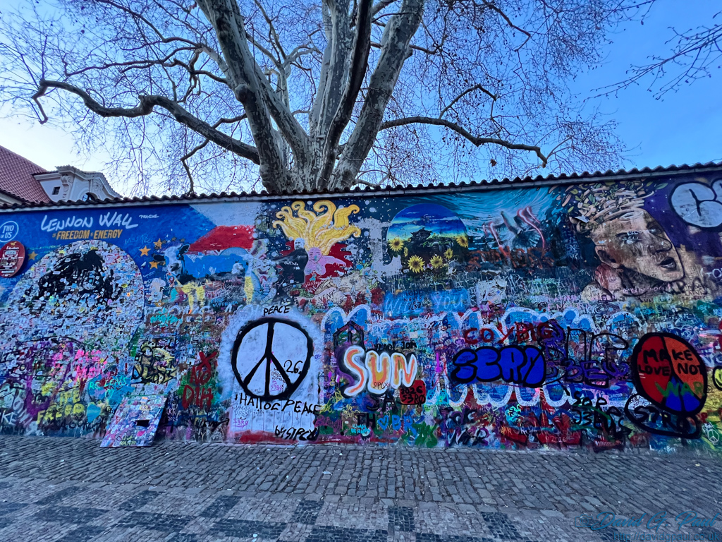A wall covered in graffiti