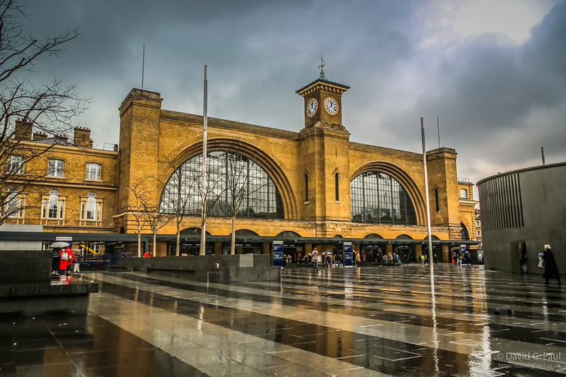 Exterior of Kingscross Station with the ground wet in front