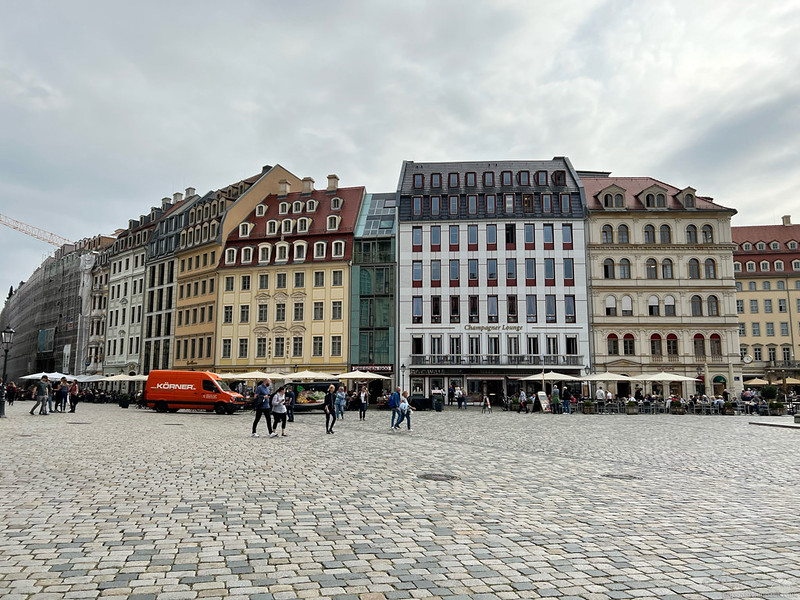 Large square surrounded by colourful buildings