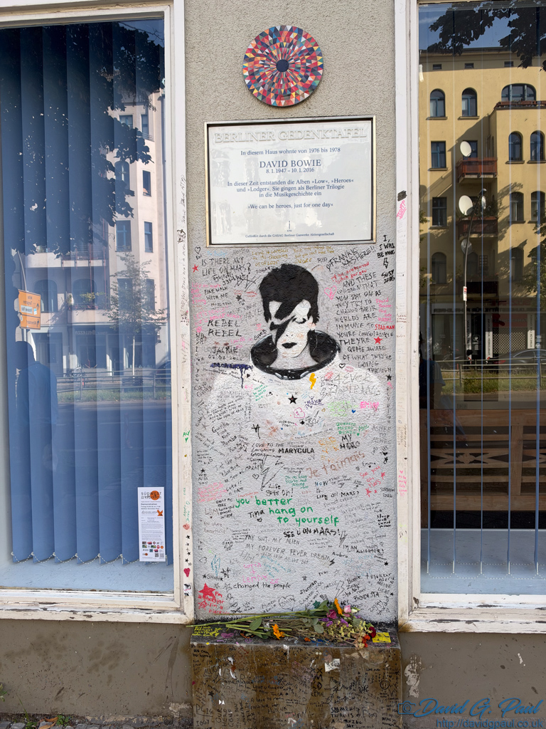 A picture of Ziggy Stardust and a plaque for David Bower